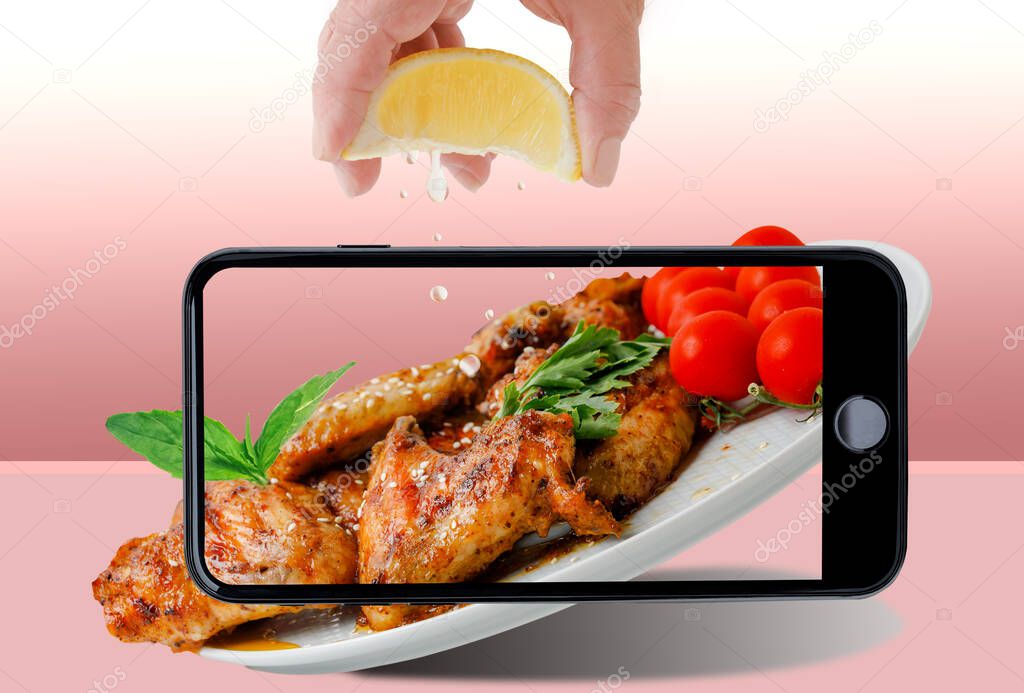 Female Hands Press Lemon Juice On Fried Chicken Wings On A Flying Plate. Side View.