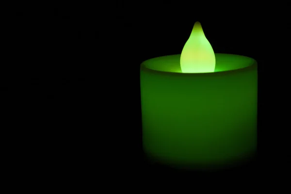 Green electric candle. — Stock Photo, Image