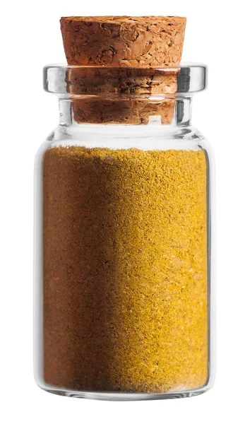 Curry spice in a little bottle isolated on white background — Stock Photo, Image