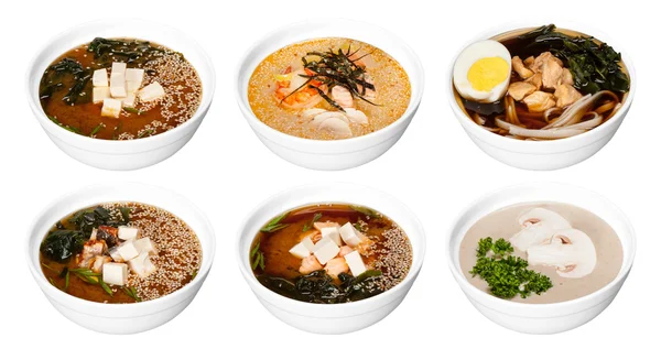 Set of bowls with asian soups — Stock Photo, Image