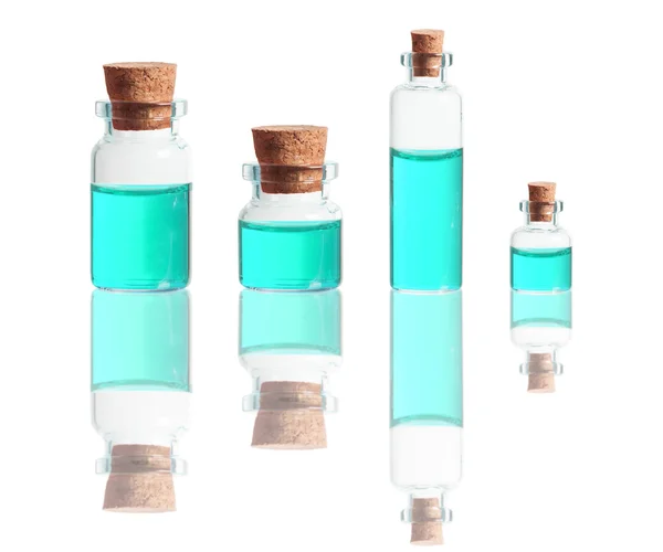 Turquoise liquid in bottles — Stock Photo, Image