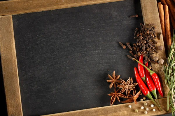 Chalkboard  with spices collection — Stock Photo, Image