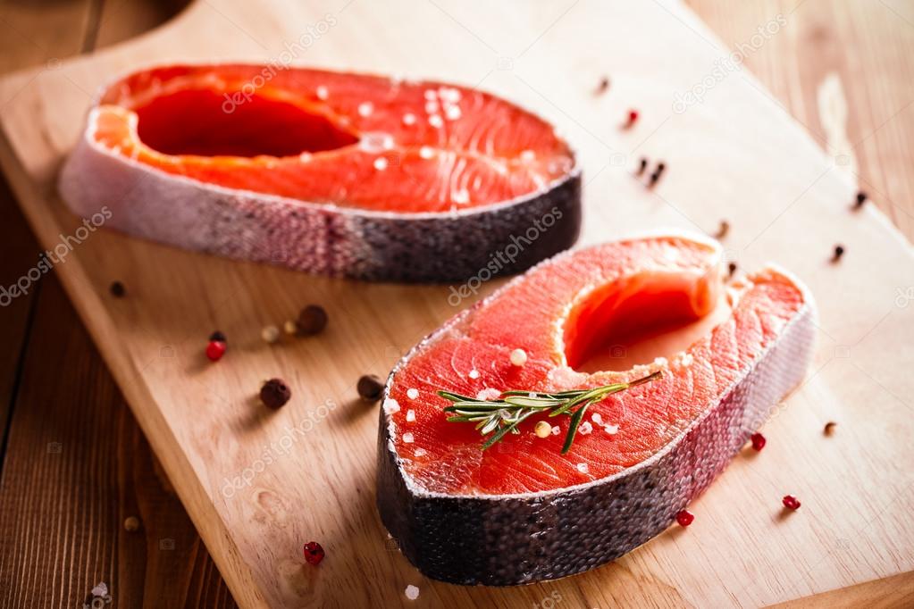 Raw salmon steaks