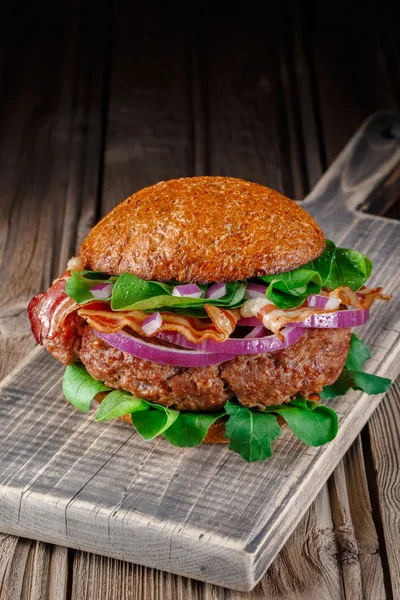 Burger with bacon close up. — Stock Photo, Image