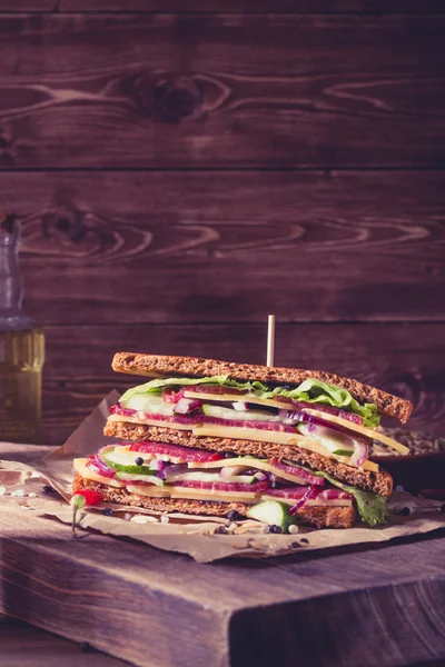One sandwich on old papper — Stock Photo, Image