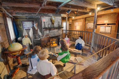 Interior of the Oldest Wooden Schoolhouse in the United States clipart