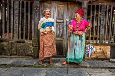 Two very old women discuss in Bandipur, Nepal