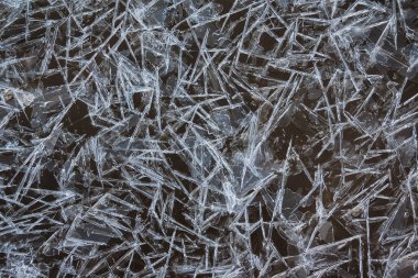 Soyut olarak kara buz yüzeyini çatlattı. Doku arkaplanı.