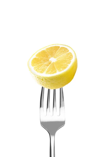 Свіжий лимон на виделці — стокове фото
