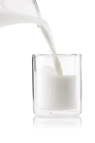 Mjölk splash från glas — Stockfoto