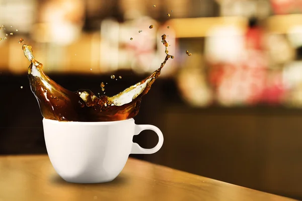 Кофе всплеск в кафе — стоковое фото