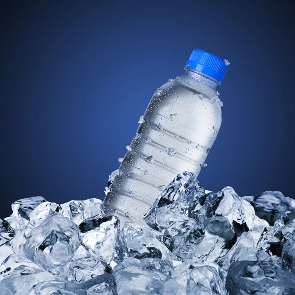 Cold Water Bottle On Ice Cubes — Stock Photo, Image