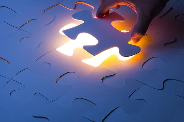 Hand holding Missing jigsaw puzzle piece — Stock Photo, Image