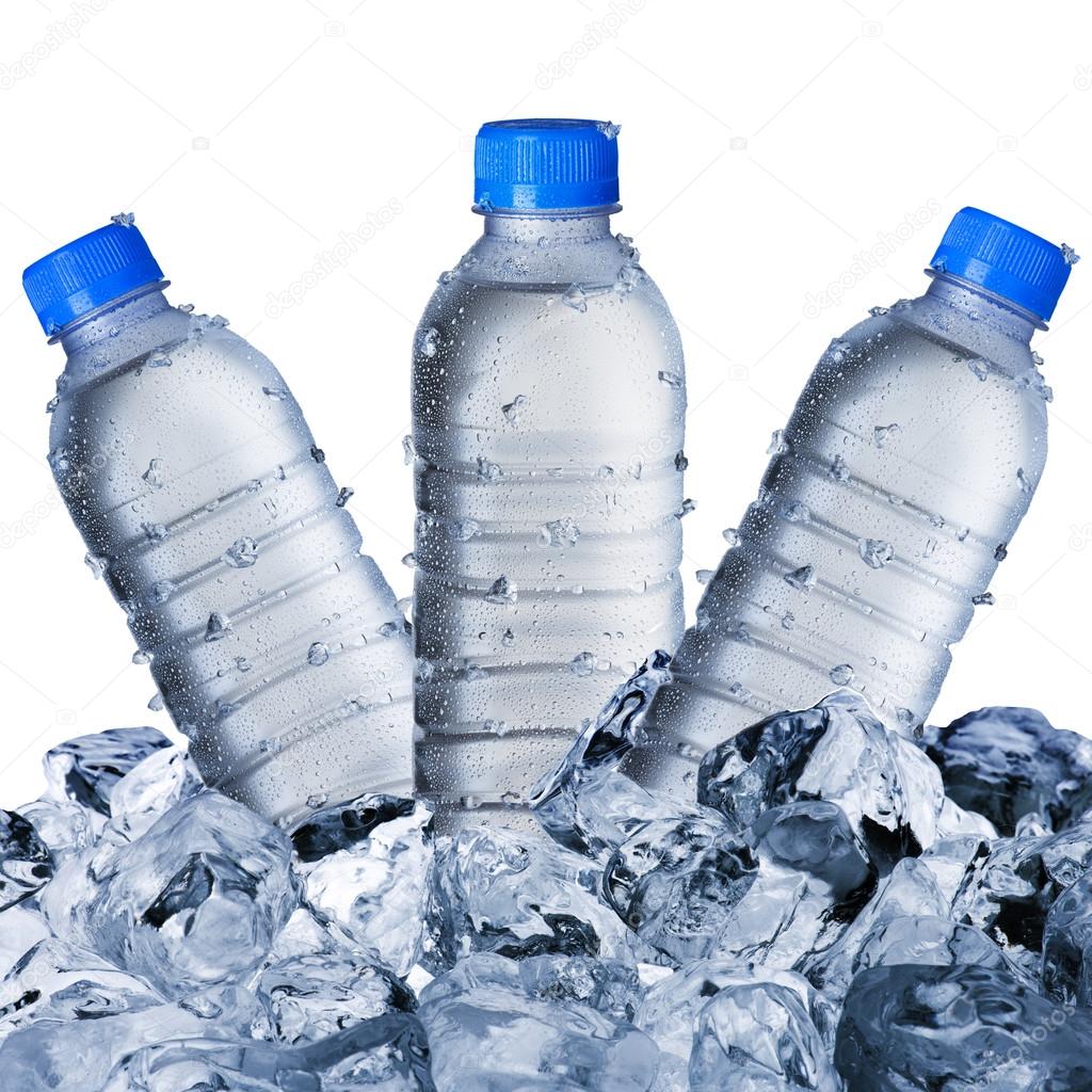 Cold Water Bottles On Ice Cubes Stock Photo by ©somchaij 64740945