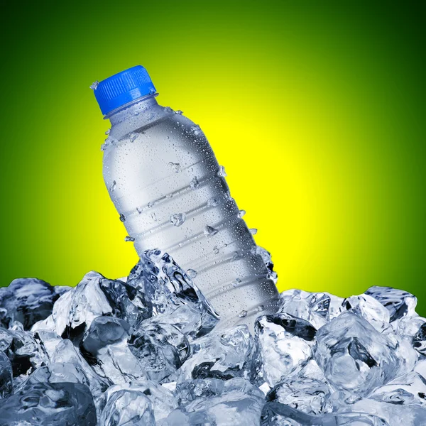 Cold Water Bottle On Ice Cubes — Stock Photo, Image