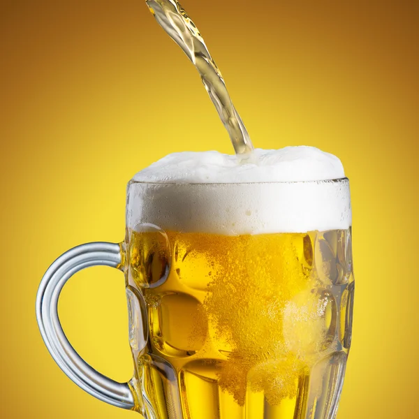 Beer pour from Bottle to Glass — Stock Photo, Image