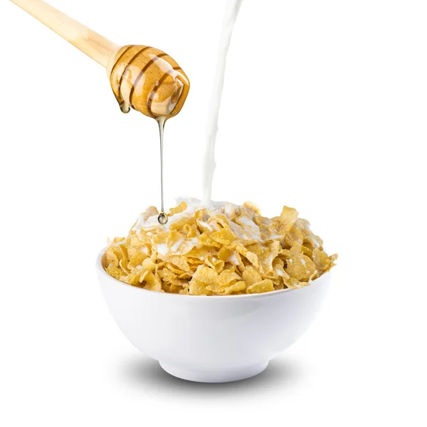 Honey, flakes and milk — Stock Photo, Image