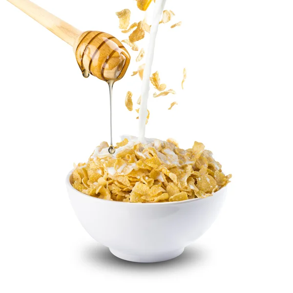 Honey, flakes and milk — Stock Photo, Image