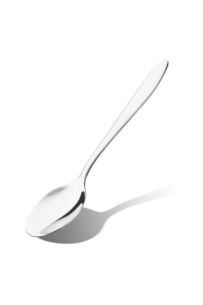 Cucchiaio d'argento su bianco — Foto Stock