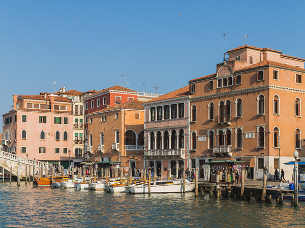 VENICE, ITALY - 13TH MARCH 2015: Buildings, boats and people in the Santa Croce district