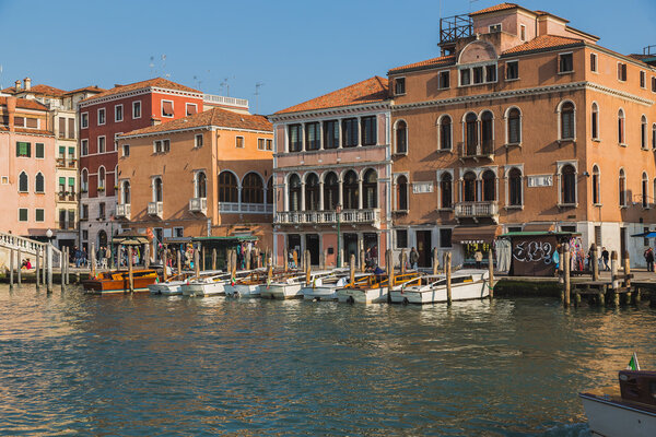 VENICE, ITALY - 13TH MARCH 2015: Buildings, boats and people in the Santa Croce district