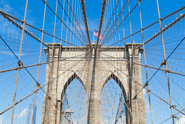 A view of the arches of Brooklyn Bridge in NYC
