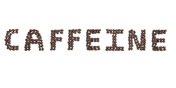 Koffein skriven med kaffebönor — Stockfoto