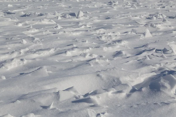 Fondo de nieve con protuberancias — Foto de Stock