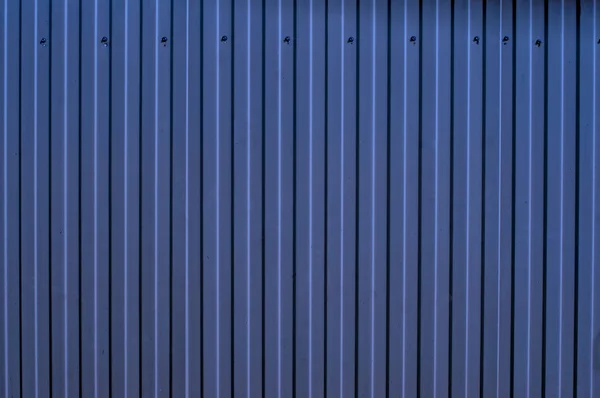 Valla metálica ondulada azul como fondo — Foto de Stock