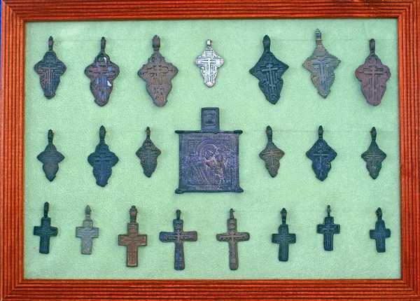 Collection of small old iron crucifixes — Stock Photo, Image