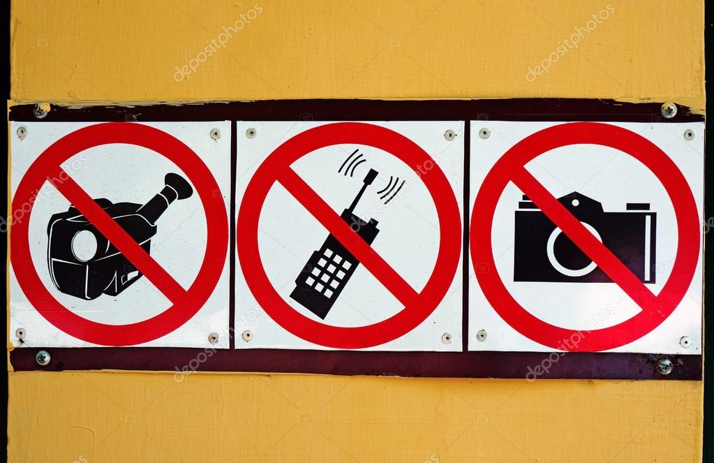 Signs prohibiting pictures, shoot video and use of mobile commun
