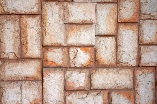 La textura de la pared de las grandes piedras beige — Foto de Stock