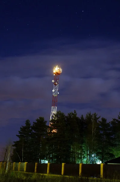 Cellular tower on a background starry sky