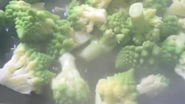Baking romanesco cabage with lots of steam — Stock Video