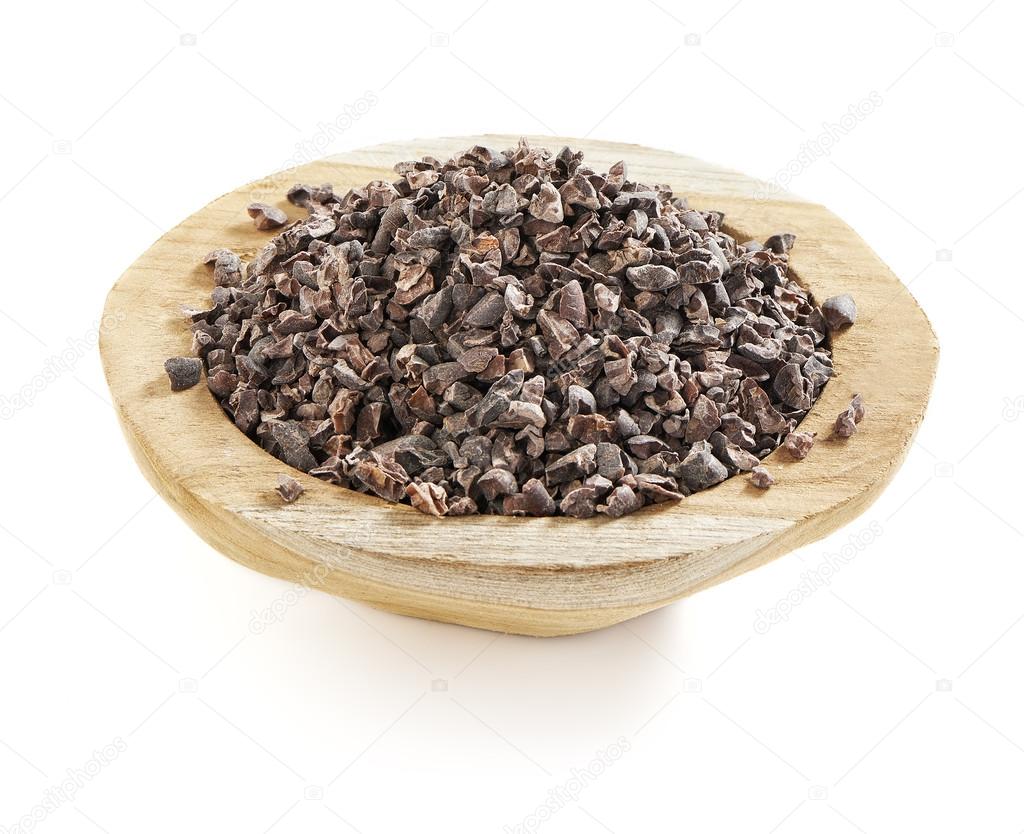 cacao nibs in a wooden bowl