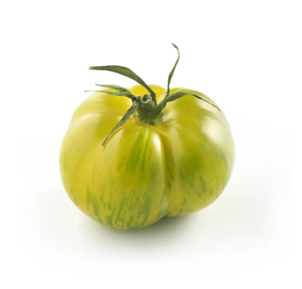 Tomate tigrée verte sur blanc — Photo