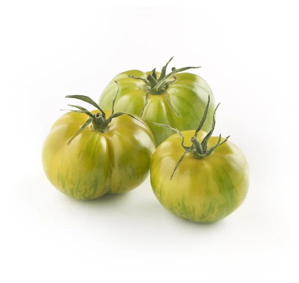 Trio of fresh green tiger tomatoes — Stock Photo, Image