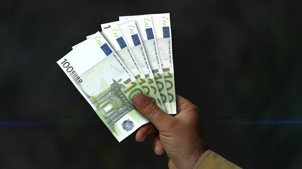 Euro fan of money in hand 3d illustration. EUR banknotes background concept of finance, economy crisis, inflation and business in Europe.