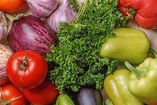 Top view close-up vegetables and herbs. Harvest autumn background
