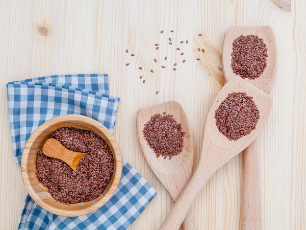 Alternative health care and dieting flax seeds in wooden spoon s