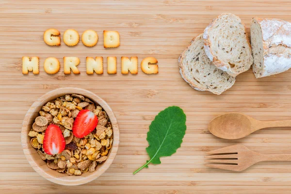 Good morning concept - Cereal in wooden bowl with strawberry and — Stock Photo, Image