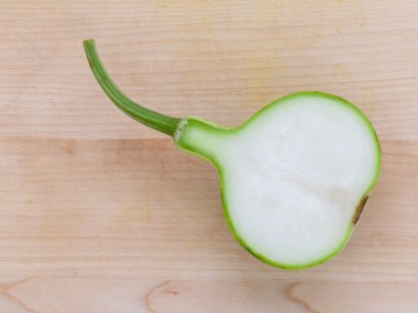Yarım şişe kaved veya calabash kanın . Sebzelerden biri.