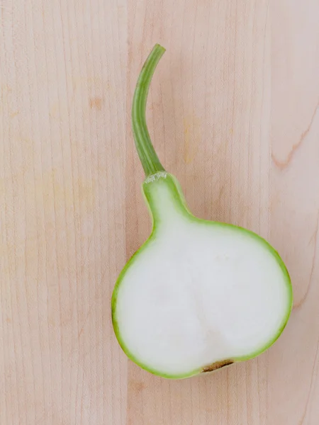 Halved bottle gourd or calabash gourd .The one of the vegetables — Stock Photo, Image
