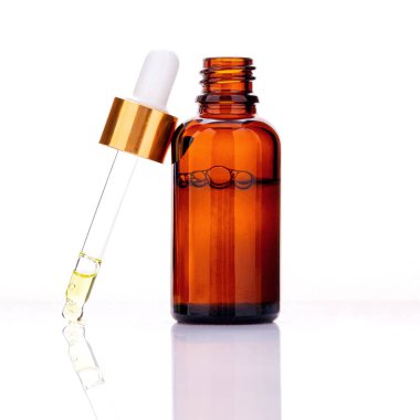  Essential oil bottles with dropper and bubble isolated on white background.