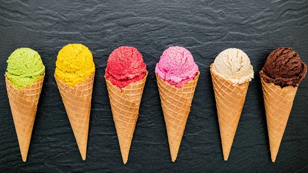 Various Ice Cream Flavor Cones Blueberry Lime Pistachio Almond Orange — Stock Photo, Image