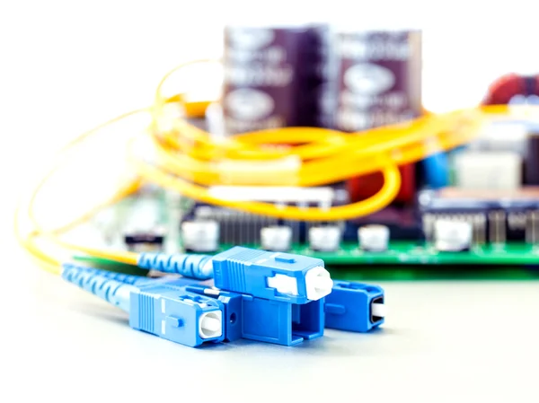 Closeup of fiber optic connector with Circuits board — Stock Photo, Image