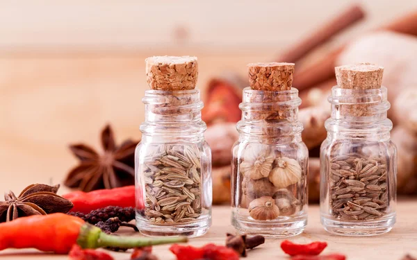 Assortment of Thai food Cooking ingredients in glass bottles on — Stock Photo, Image