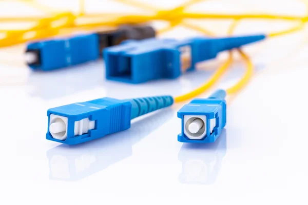 Fiber Optics connectors symbolic photo for fast internet connect — Stock Photo, Image