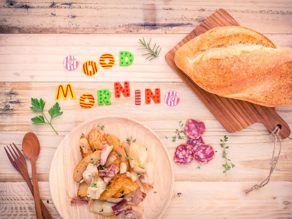 Breakfast  setup on wooden table with colourful Good Morning wor — Stock Photo, Image