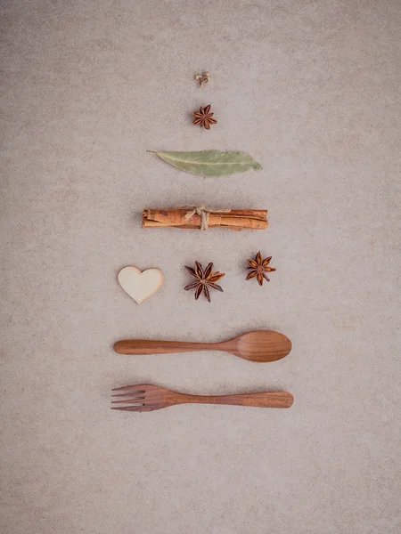 Wooden spoon ,fork ,cinnamon ,star anise ,wooden heart — Zdjęcie stockowe